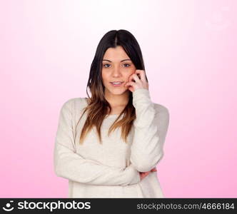 Attractive girl with sensuality expression isolated on pink background