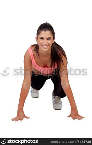 Attractive girl with sports clothes making pushup isolated on a white background