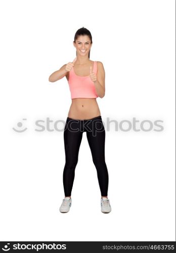 Attractive girl with sports clothes saying Ok isolated on a white background