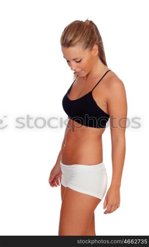 Attractive girl with underwear looking her body isolated on a white background
