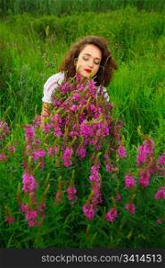 attractive girl with vivid flowers. outdoor shot