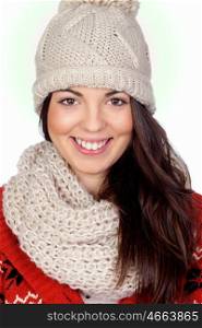 Attractive girl with with wool hat and scarf isolated on white and green background