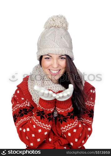 Attractive girl with with wool hat and scarf throwing a kiss isolated on white