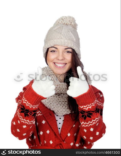 Attractive girl with wool hat and scarf saying Ok isolated on white background