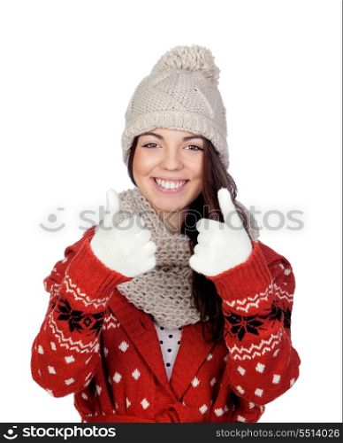 Attractive girl with wool hat and scarf saying Ok isolated on white background