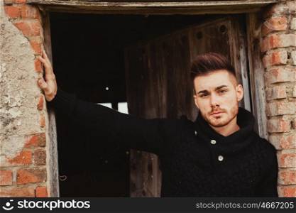 Attractive guy in a old house. Photos for ads