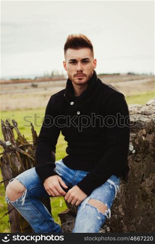 Attractive guy in the field. Photos for ads