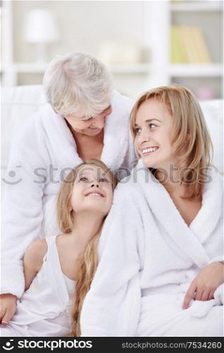 Attractive happy family at home