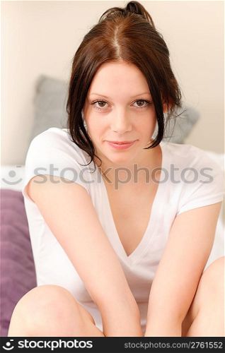 Attractive high-school girl wake up in student apartment