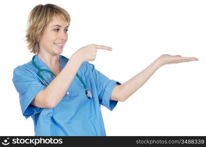 Attractive lady doctor indicating your hand empty over a white background
