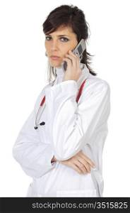 Attractive lady doctor speaking on the telephone over a white background