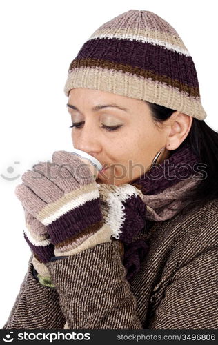 attractive lady sheltered for the winter drinking a tea cup a over white background