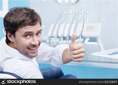 Attractive man in a the dental chair