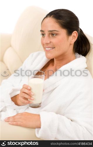 Attractive mid-aged woman drink glass of milk for breakfast