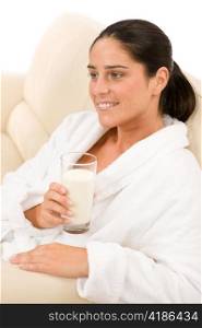 Attractive mid-aged woman drink glass of milk for breakfast