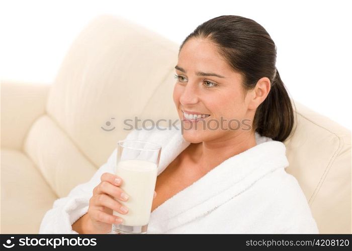 Attractive mid-aged woman drink glass of milk for breakfast portrait