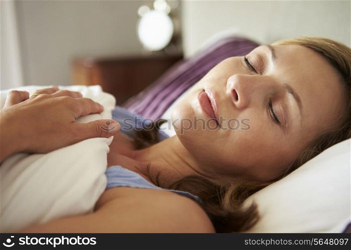 Attractive Middle Aged Woman Asleep In Bed