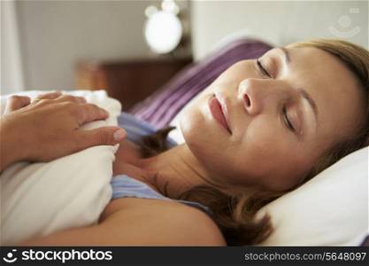 Attractive Middle Aged Woman Asleep In Bed