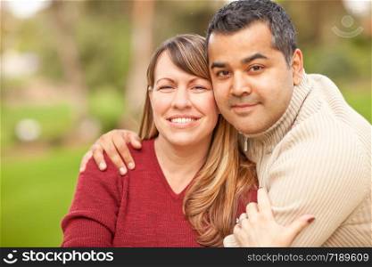 Attractive Mixed Race Couple Portrait in the Park.