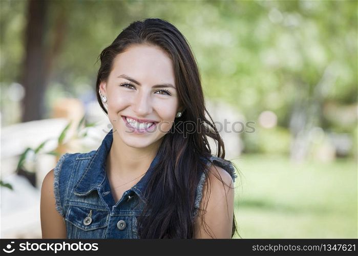 Attractive Mixed Race Girl Portrait Outdoors.