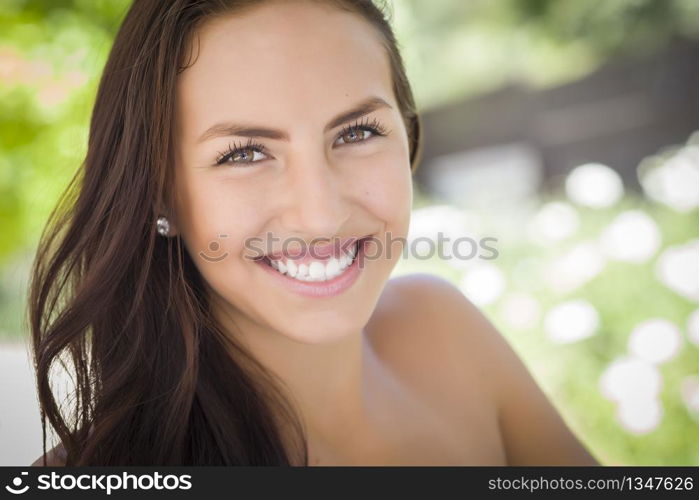 Attractive Mixed Race Girl Portrait Outdoors.