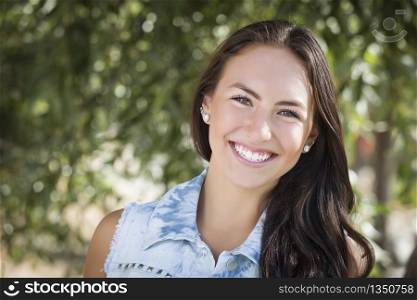 Attractive Mixed Race Girl Portrait Outdoors.
