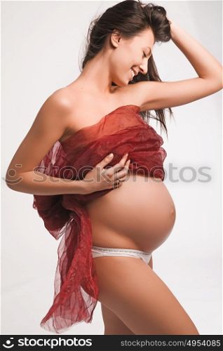 Attractive pregnant mother expecting a child