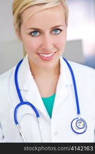 Attractive Smiling Blond Woman Doctor With Stethoscope