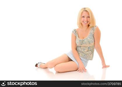Attractive smiling blonde posing over white background