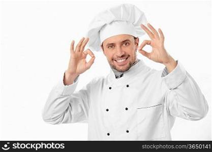 Attractive smiling chef on a white background