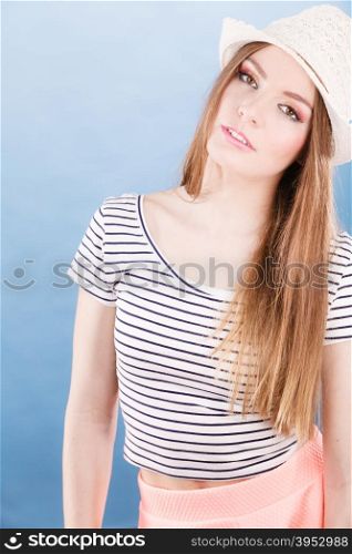 Attractive tourist girl in straw hat.. Vacation and rest. Portrait of attractive lovely girl in straw hat. Young tourist woman enjoy holidays and summer time.