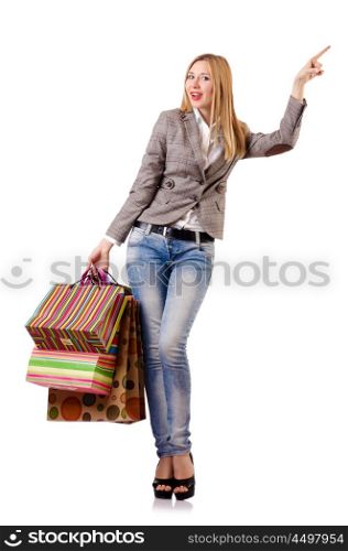 Attractive woman after christmas shopping on white