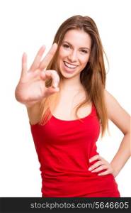 Attractive woman doing OK sign over white background