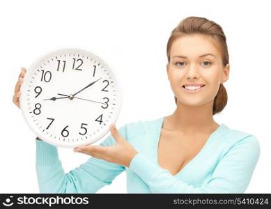 attractive woman holding wall clock in her hands