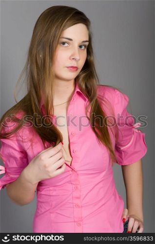 attractive woman in a pink shirt