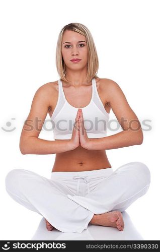 Attractive woman in yoga position on white background