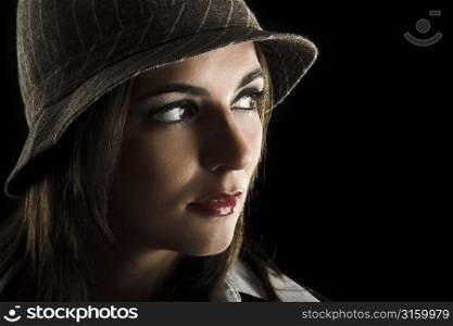 Attractive woman on a black background