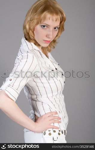 attractive woman on a gray background