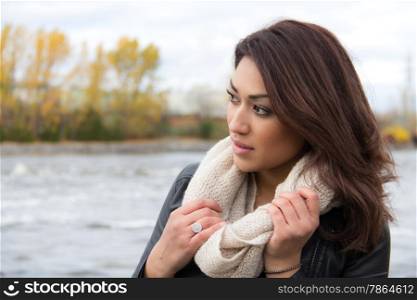 Attractive woman outside on a cold autumn day