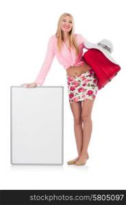Attractive woman preparing for vacation with suitcase and blank board isolated on white