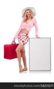 Attractive woman preparing for vacation with suitcase and blank board isolated on white