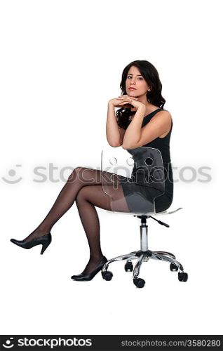 Attractive woman sitting on a chair