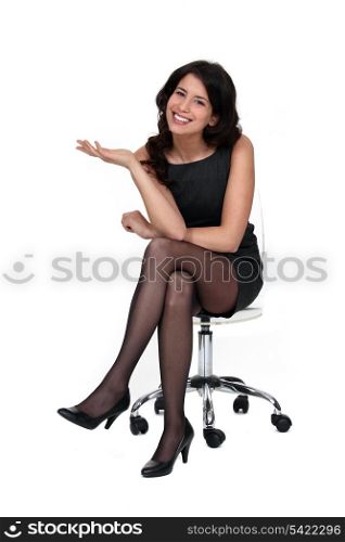 Attractive woman sitting on a chair