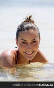 Attractive woman swimming