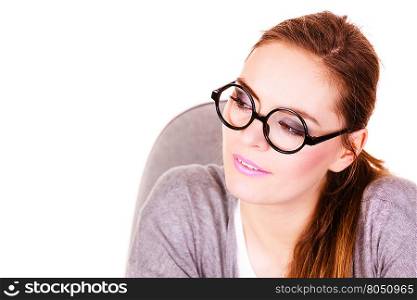 Attractive woman thinking seeks a solution, doubtful young female businesswoman wearing glasses making decision, serious face expression