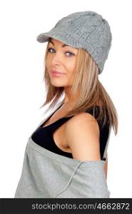 Attractive woman with a grey wool bonnet isolated on white background