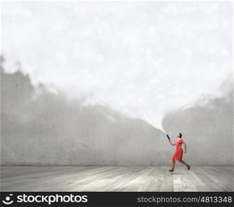 Attractive woman with book. Young woman in red dress running with book in hand