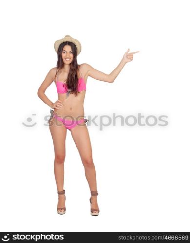 Attractive woman with pink swimwear and straw hat isolated on a white background