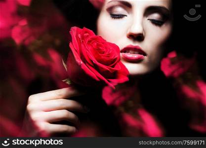 attractive woman with rose in hand