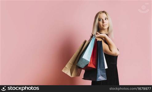 attractive woman with shopping bags